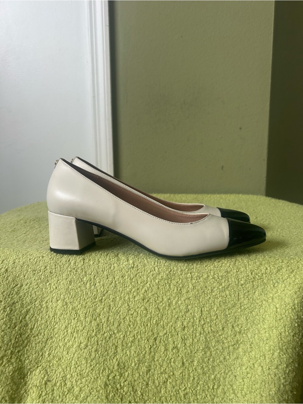 Cole Haan Two-Tone Block Heel Pumps in Ivory and Black